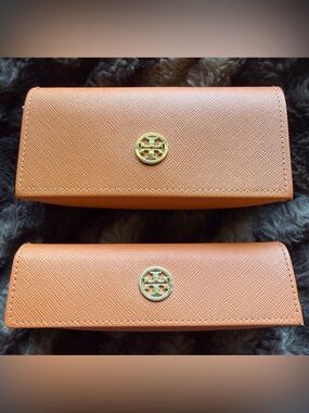 Two Tory Birch Eyeglass cases. Orange with gold hardware. See below